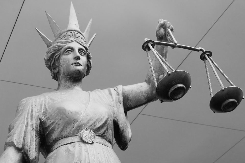 Statue of Lady Justice holding scales